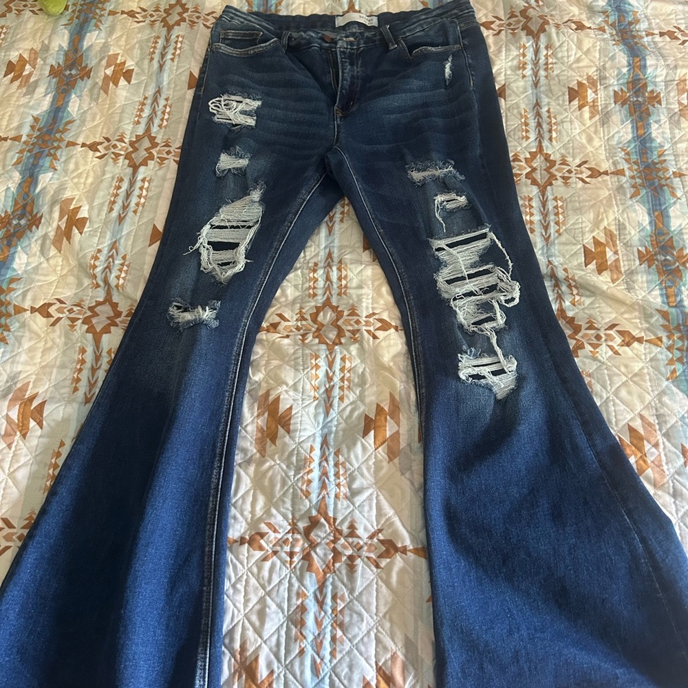 Flare Wide Leg Jeans with Vintage Distressing